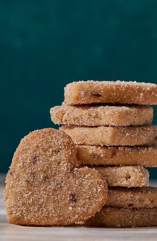 Valentina mexican pecan cinnamon cookies on dark plate, heritage polvorón-style shortbread cookies