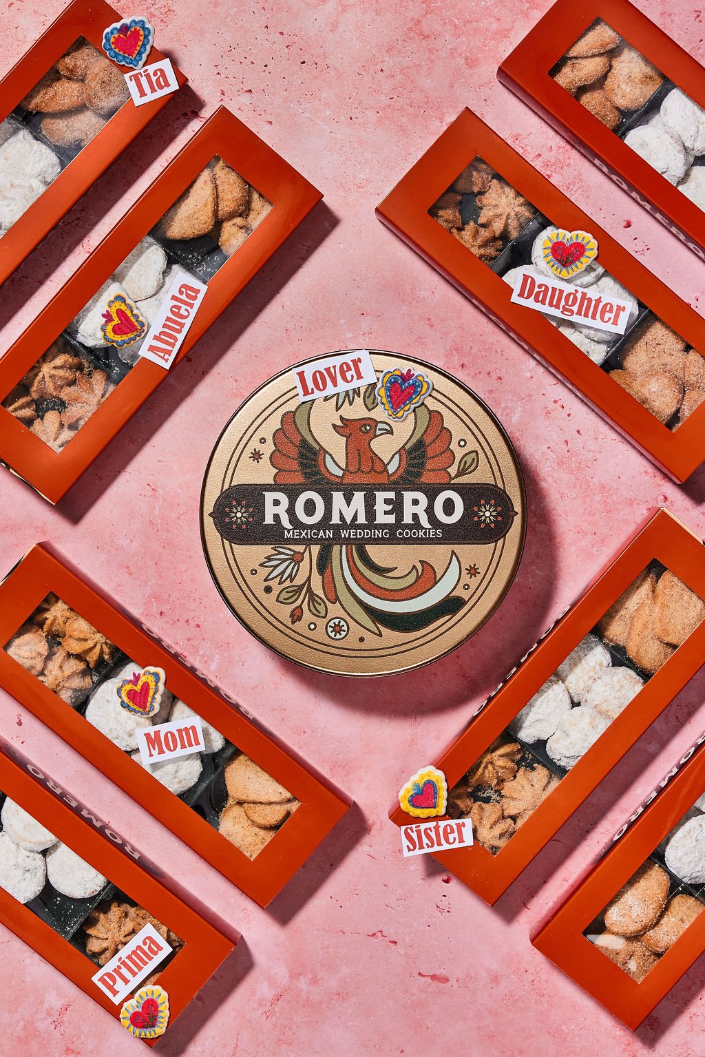 romero cookie favors shown around romero cookie tin with phoenix logo