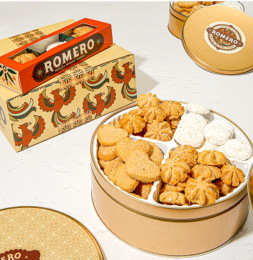 Open Romero cookie tin with variety cookies