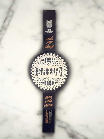 'salud' cookie paper band displayed out against a white background