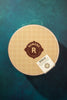 romero vintage cookie tin packaging on blue background