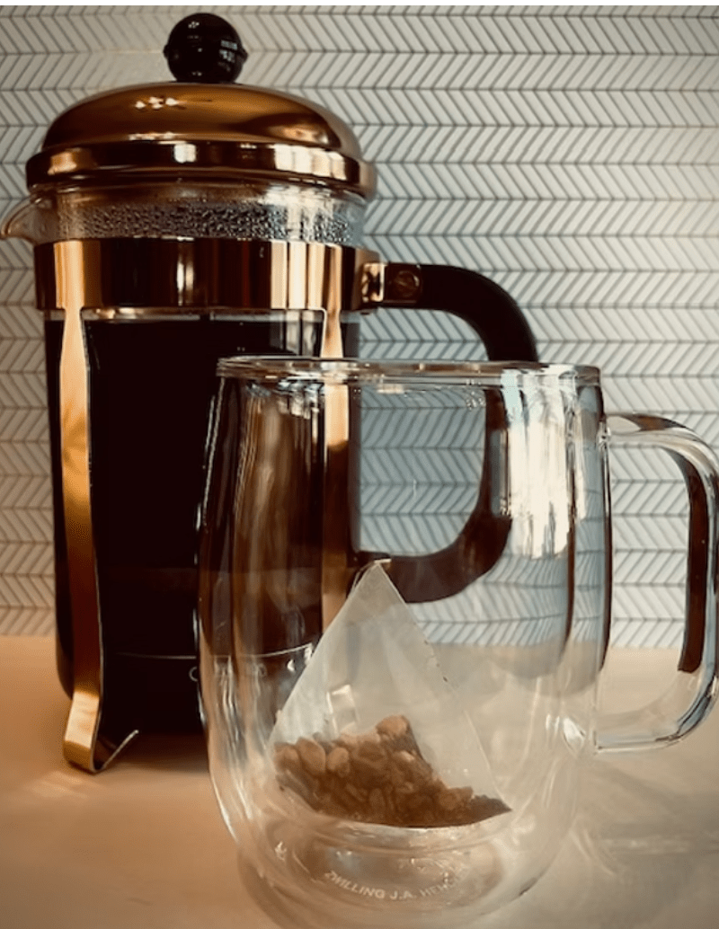 Romero chai coffee spice brewed in moka pot, traditional mexican spiced coffee styled in kitchen