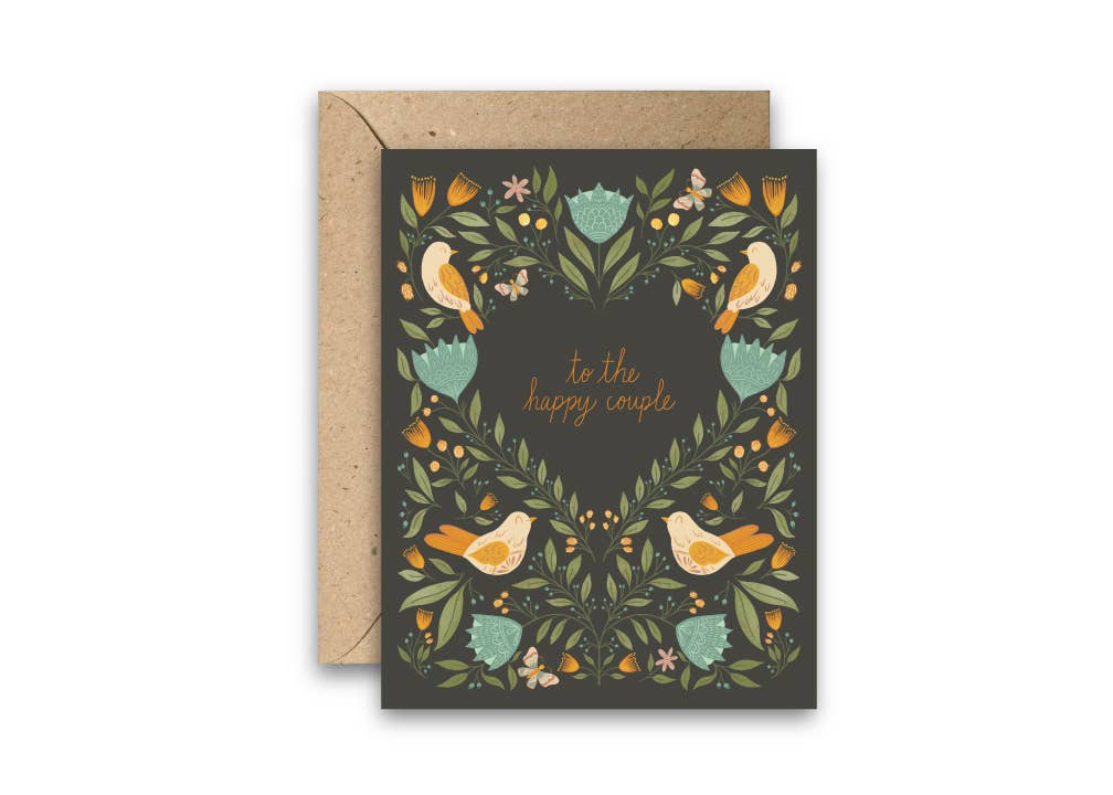 Greeting card with floral and bird design on a dark background, featuring 'to the happy couple' text