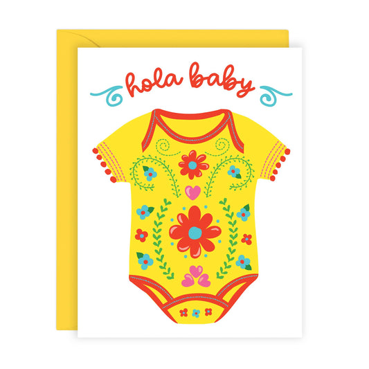 Greeting card with a yellow baby onesie illustration and 'hola baby' text on a white background